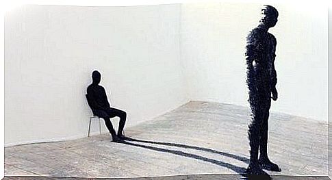 Seated man representing the archetype of the shadow