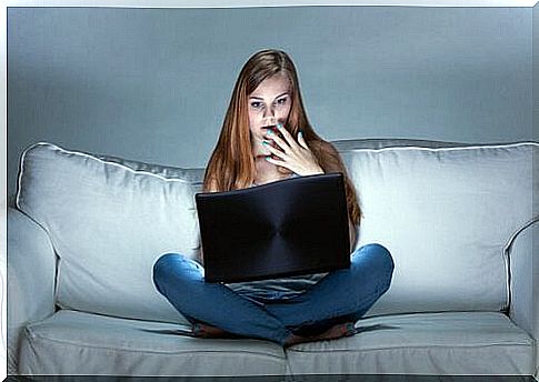 Girl watching movie on the computer