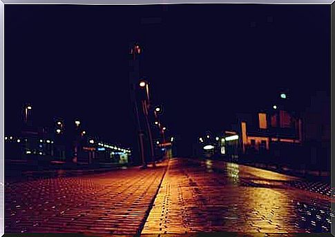 Dark street at night and criminal psychology.