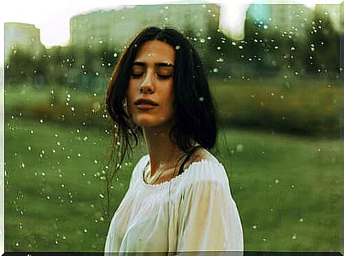 Girl with closed eyes at the park