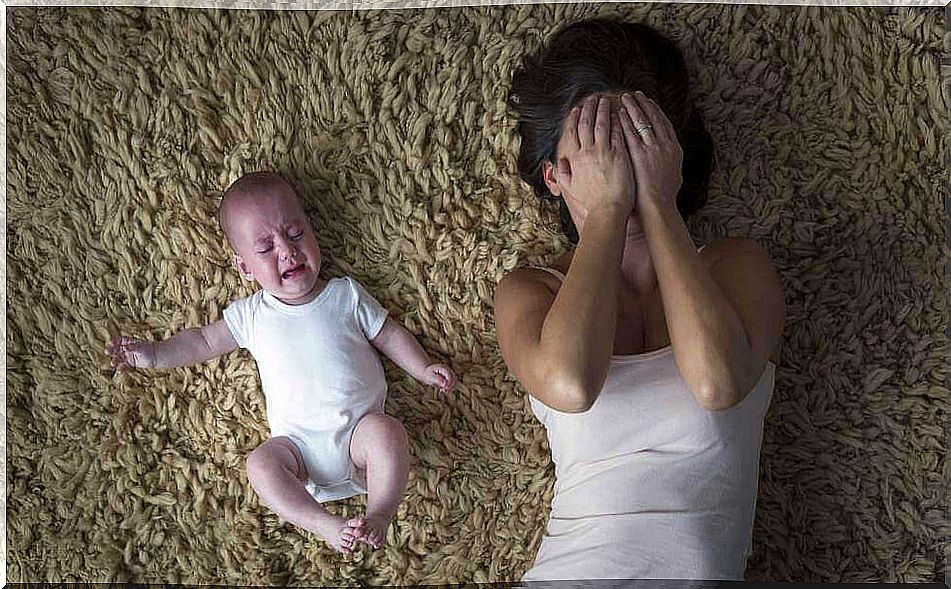 Depressed mother with crying baby