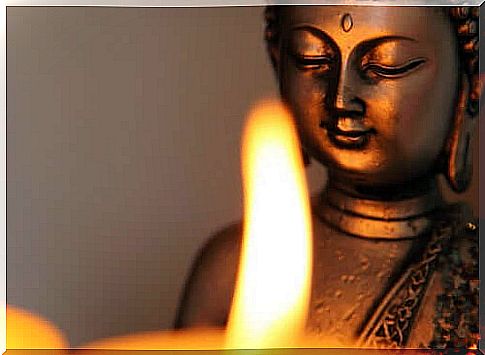 Buddha with candle light.