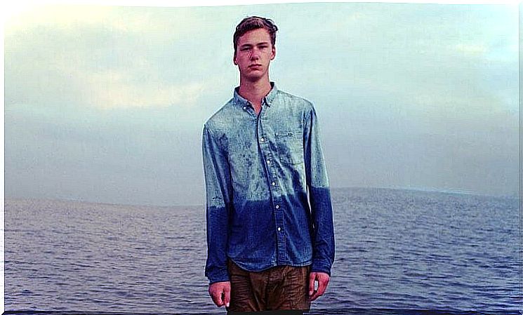 Boy in front of the sea